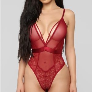 Manipulates teddy bodysuit